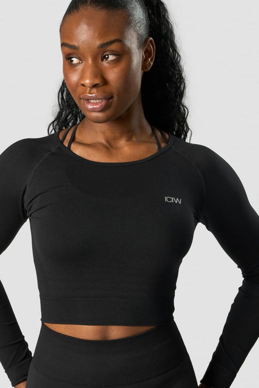 define seamless ls crop top black wmn