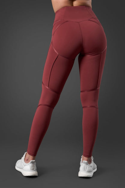 reboot tights brick red